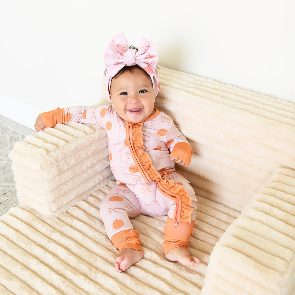 Reagan Ruffle Zip