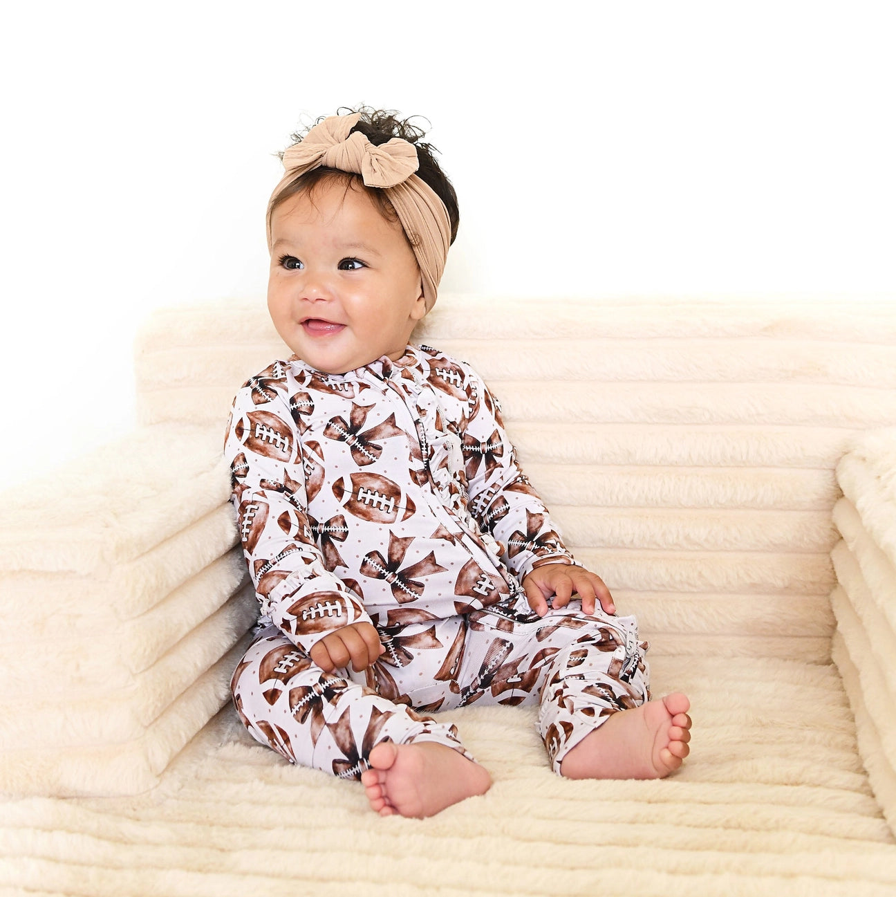 Blaire Bows Ruffle Zip