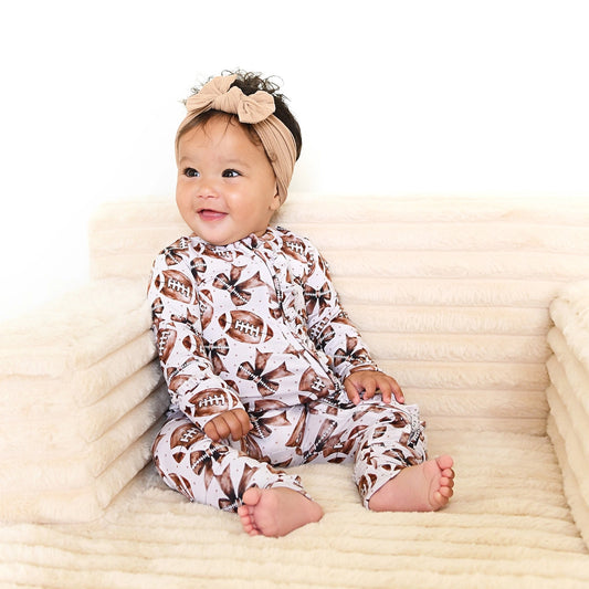 Blaire Bows Ruffle Zip